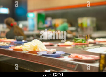 Sfocate ristorante di sushi Foto Stock