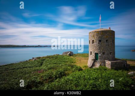 L'ancresse torre in Guernsey, Isole del Canale, Regno Unito Foto Stock