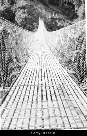 Il Chomrong ponte sospeso, sull'Annapurna Base Camp Trek, Nepal Foto Stock