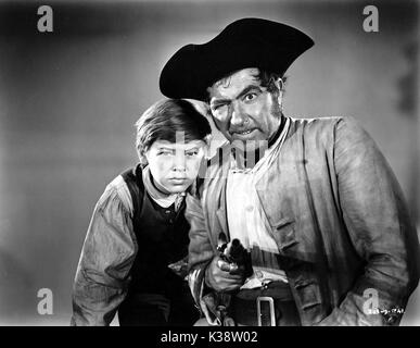 L'ISOLA DEL TESORO BOBBY DRISCOLL, ROBERT NEWTON data: 1950 Foto Stock