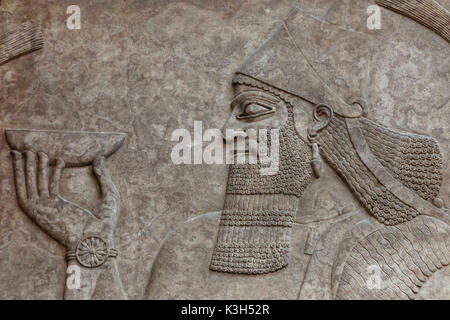 Inghilterra, Londra, British Museum, assiro sollievo da Nimrud raffigurante una scena di corte datata 865 BC Foto Stock