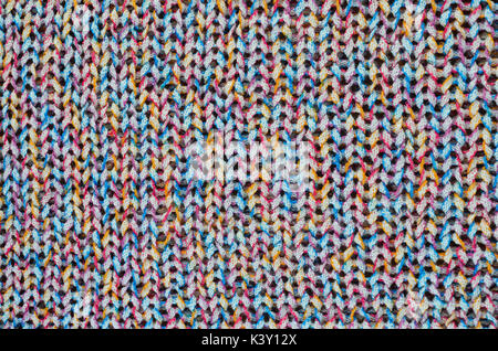 Multi-colore di tessuto a maglia accogliente sfondo texture close-up Foto Stock