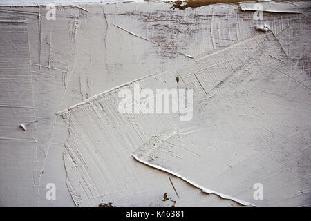 Bianco e strutturale del gesso testurizzata tamponata sulla parete Foto Stock