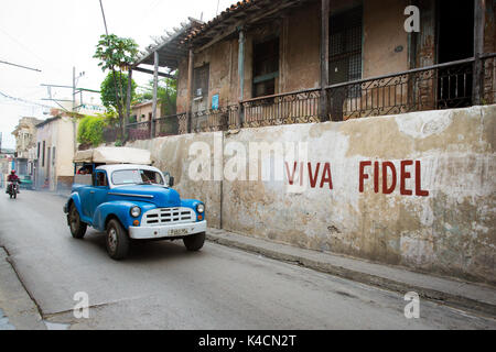 Viva Fidel, Scene di strada in Santiago de Cuba Foto Stock