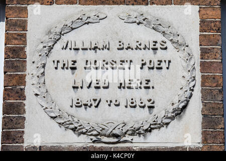 Una lapide segna la posizione in cui il dorset poeta William Barnes una volta visse il South Street in Dorchester Dorset, Regno Unito. Foto Stock