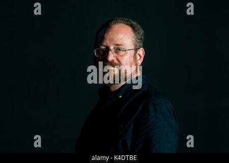 Scrittore scozzese Stuart MacBride assiste un photocall durante l'Edinburgh International Book Festival il 12 agosto 2017 a Edimburgo, Scozia. Foto Stock