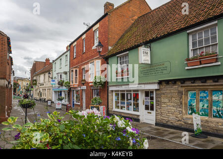 Negozi in northload street, glastonbury, Somerset, Inghilterra. Foto Stock