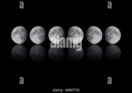 Luna bianca assortimento su nero Foto Stock
