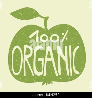 Scritte a mano del testo '100%' organico su una mela verde. Effetto timbro. Illustrazione Vettoriale