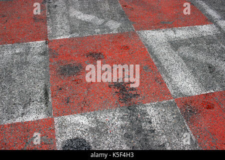 Texture della gara di asfalto e di cordolo sul Gran Premio di Monaco circuito di strada Foto Stock