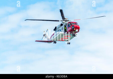 Aria e mare Salvataggio in elicottero a moelfre scialuppa di salvataggio giorno 2017 evento su anglesey Foto Stock