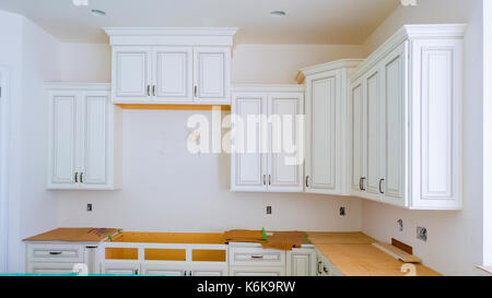 Interior design costruzione di una cucina con fornello estrattore cofano Foto Stock