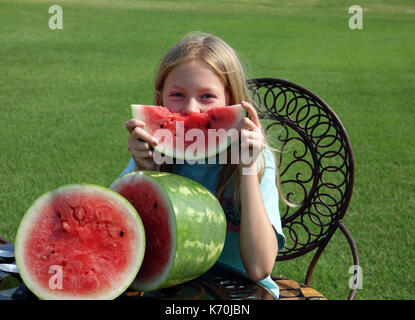 I bambini amano i cocomeri! Foto Stock