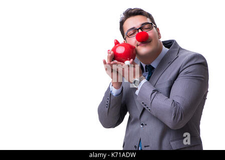 Funny clown imprenditore con un salvadanaio isolati su sfondo bianco Foto Stock