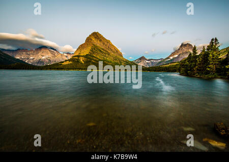 Montare grinnell riflessione Many Glacier glacier national park sunirse Foto Stock