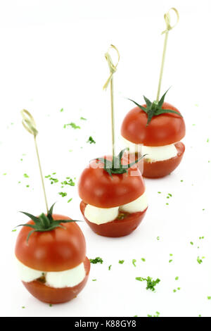 Finger food. Pomodorini con Mozzarella Foto Stock