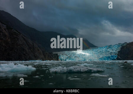 Luce drammatica su South Sawyer Glacier nel braccio di Tracy Ford terrore wilderness area del Sudest Alaska Foto Stock