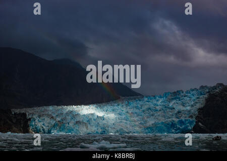 Luce drammatica su South Sawyer Glacier nel braccio di Tracy Ford terrore wilderness area del Sudest Alaska Foto Stock