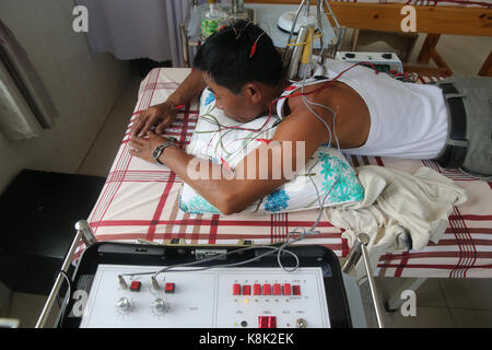 Clinica di medicina tradizionale vietnamita. Agopuntura. cu chi. vietnam. Foto Stock