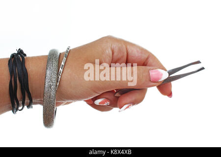 Pinzetta isolata su sfondo bianco. Foto Stock