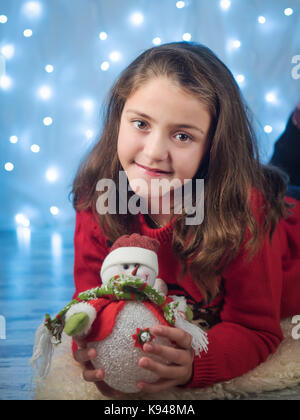 Carino bambina per il nuovo anno Foto Stock