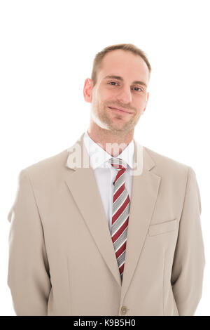 Ritratto di imprenditore fiducioso in piedi contro uno sfondo bianco Foto Stock