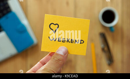 Io amo weekend scritto in ufficio Foto Stock