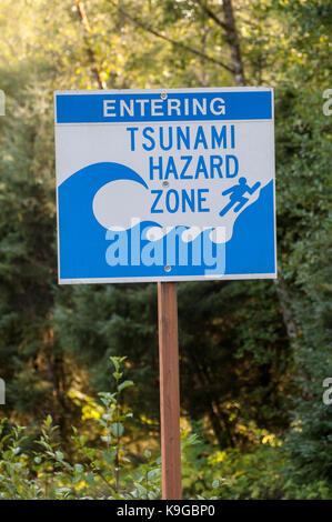 Cannon Beach, Oregon. tsunami zona a rischio di segno di avvertimento. Foto Stock