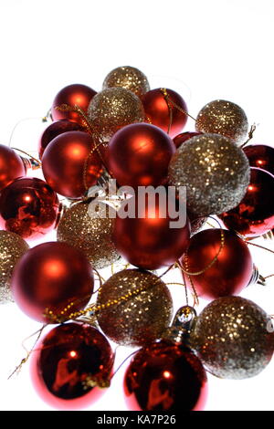 Natale rosso e oro glittery baubles Foto Stock