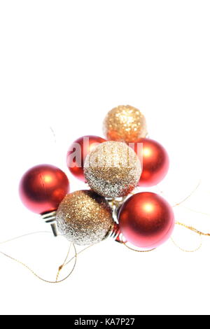 Natale rosso e oro glittery baubles Foto Stock