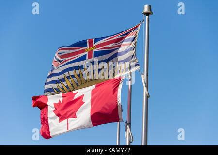 British Columbia bandiera sventola su blue sky in Vancouver, BC, Canada Foto Stock