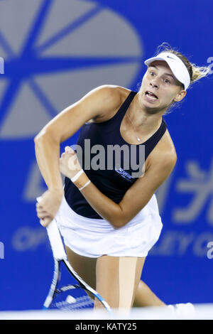 Wuhan, Cina. Il 27 settembre, 2017. (Solo uso editoriale. Cina out).spagnolo-venezuelano di giocatore di tennis professionista garbine muguruza sconfigge il polacco giocatore di tennis magda linette 2-1 a wta wuhan aprire a Wuhan, Cina centrale della provincia di Hubei. Credito: sipa asia/zuma filo/alamy live news Foto Stock