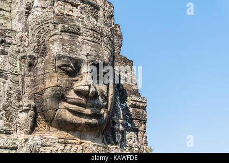 Sorriso in pietra faccia a tempio Bayon in Angkor Thom siem reap Cambogia Foto Stock