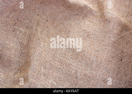 Stropicciata Hessian sack panno o gunny sack, il fuoco selettivo Foto Stock