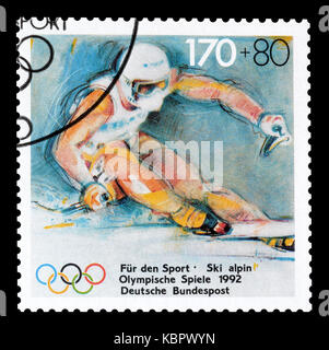Annullato francobollo stampato dalla Germania, che promuove olimpiadi estive ed invernali, circa 1992. Foto Stock
