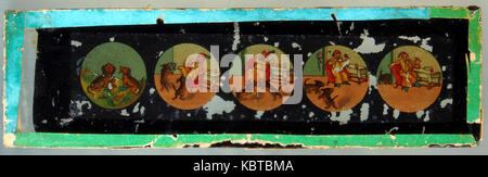 Storia di un uomo e di due cani tenendo le sue scarpe Foto Stock