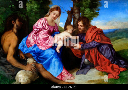 La Vergine e il bambino in un paesaggio con San Giovanni Battista e un altro santo maschio - Titian (Tiziano Vecellio), circa 1520 Foto Stock