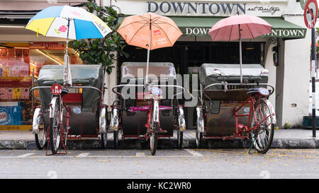 Georgetown, Penang, Malesia - 11 febbraio 2017:triciclo a la strada di George Town, Penang, Malaysia Foto Stock