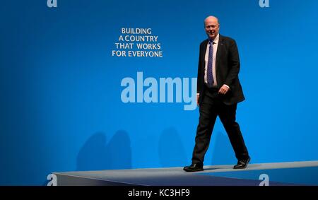 Il segretario di stato per i trasporti chris grayling presso il congresso del partito conservatore al Manchester Central convention complex in Manchester. Foto Stock