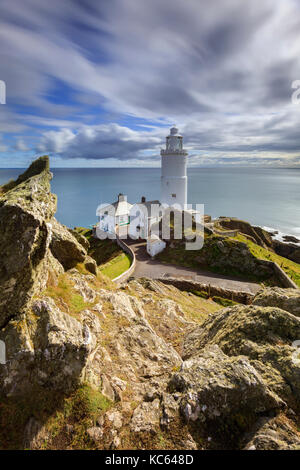 Punto di partenza il faro in South Devon. Foto Stock