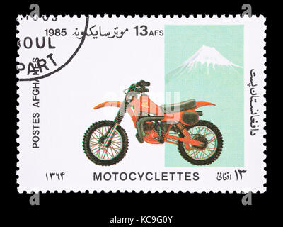 Francobollo da Afghanistan raffigurante un motociclo. Foto Stock