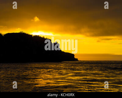 TRAMONTO SULL'ISOLA BARTOLOMÉ - GALAPAGOS, ECUADOR Foto Stock