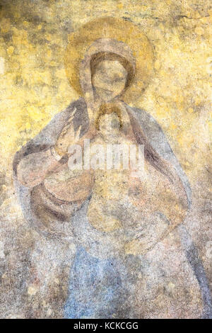 Antico affresco della Vergine Maria con il bambino Gesù Cristo (religione, fede, la vita eterna, Dio, il concetto di anima). Foto Stock