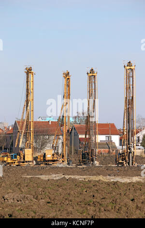 Quattro idraulici di macchine di foratura sul sito in costruzione industry Foto Stock