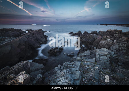 Iceberg al tramonto, il Dungeon del Parco Provinciale, su Capo Bonavista, Terranova e Labrador Foto Stock