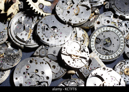 Rotture di orologi meccanici sfondo Foto Stock