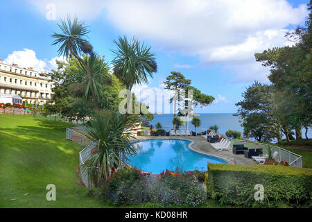 L' Osborne Hotel, Torquay affacciato sulla piscina e tor bay. Un classico regency / stile georgiano crescent costruito nel 1848. Il Grade ii Listed Foto Stock