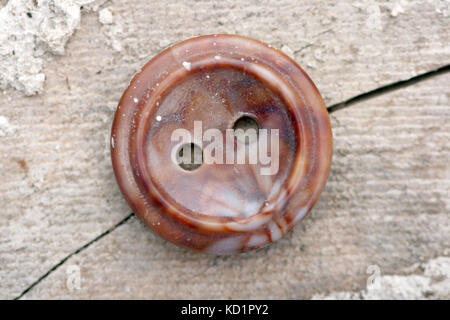 Immagine del vecchio usato pulsante sweing Foto Stock