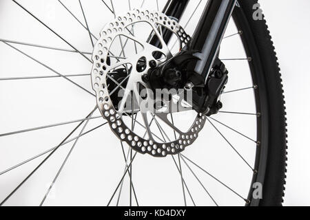 Primo piano del disco freno di una bicicletta di montagna. Foto Stock