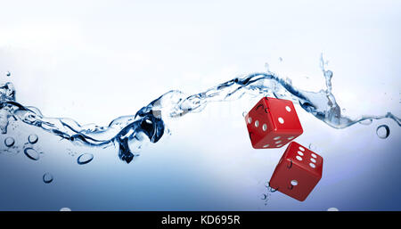 Digital immagine composita di dadi rossi contro acqua la formazione di bolle sulla superficie del bianco Foto Stock
